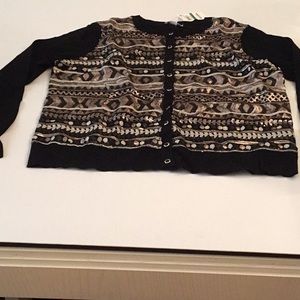 Cardigan knit sweater w/ black and gold sequins.